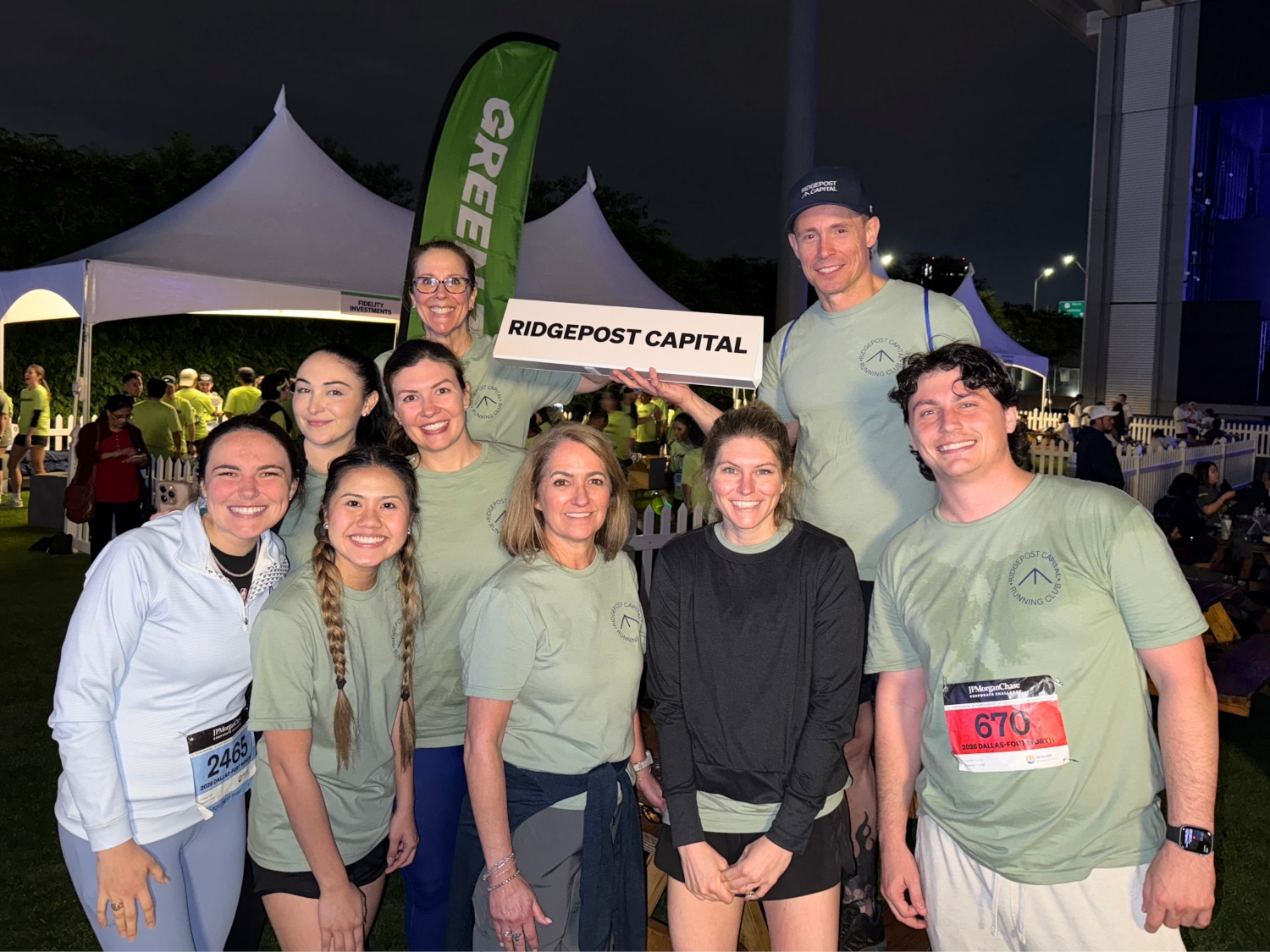 Nine members of the Ridgepost Capital team after competing in the JP Morgan run
